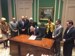 COVER 2. bill signing